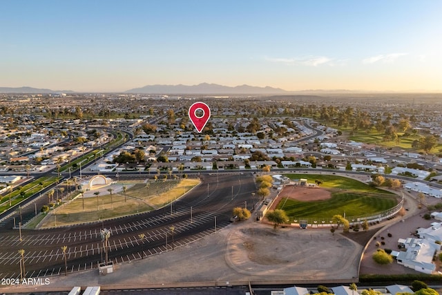 aerial view at dusk with a mountain view