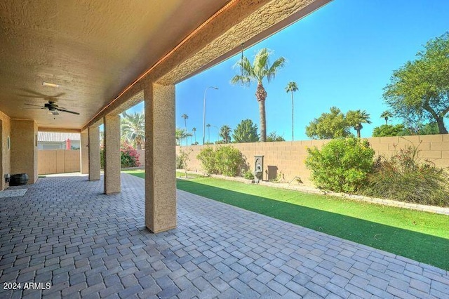 view of patio / terrace featuring ceiling fan