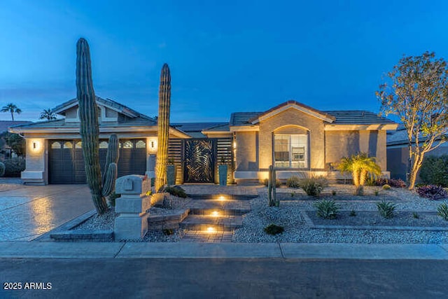 view of front of property featuring a garage