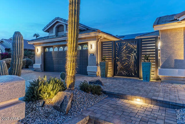 view of front of home featuring a garage