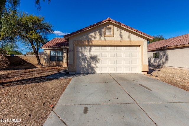 view of front of property featuring a garage