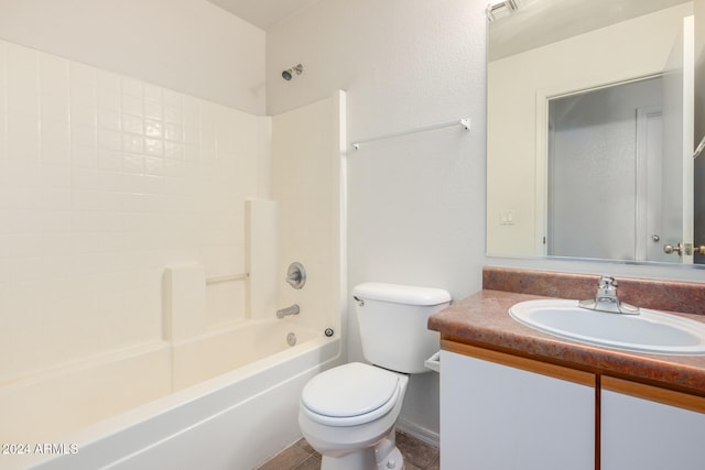 full bathroom featuring bathtub / shower combination, vanity, and toilet