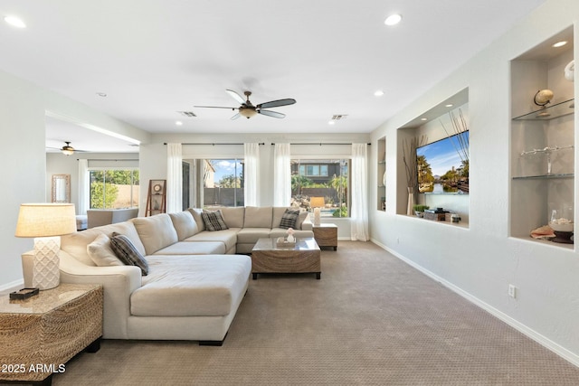 living room with a ceiling fan, visible vents, carpet, baseboards, and recessed lighting