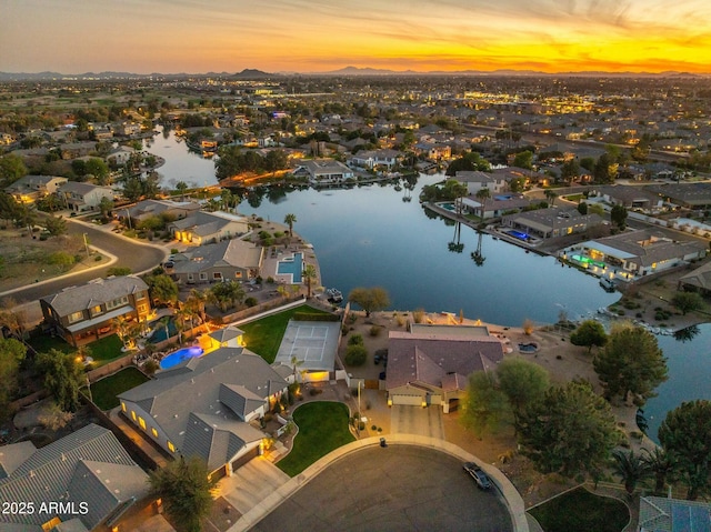 aerial view featuring a residential view and a water view