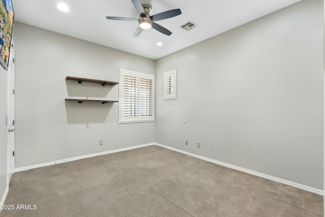 carpeted empty room featuring a ceiling fan, recessed lighting, baseboards, and visible vents