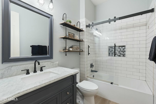 full bath with vanity, toilet, wood finished floors, and tub / shower combination