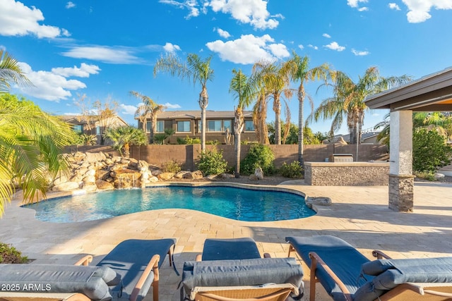 view of swimming pool featuring a patio, a fenced backyard, and a fenced in pool