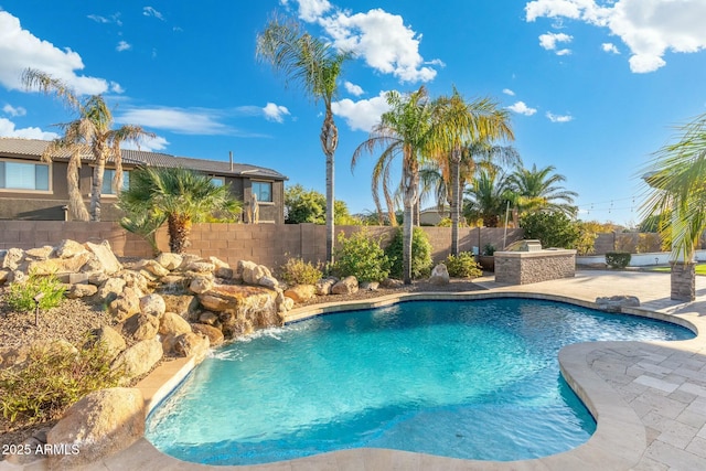 view of pool with a patio area, a fenced in pool, and a fenced backyard
