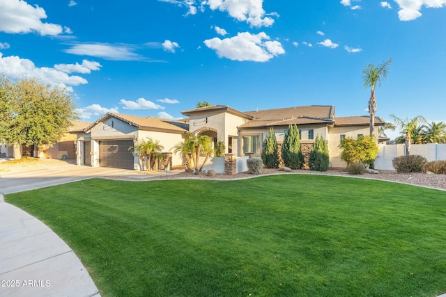 view of front of house featuring stucco siding, driveway, an attached garage, and a front yard