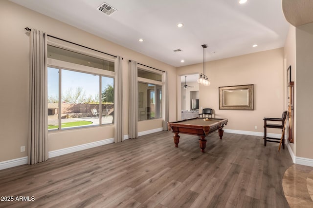 rec room with pool table and hardwood / wood-style floors