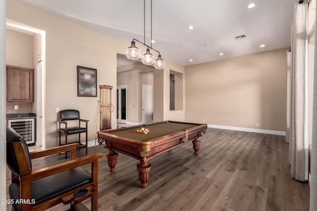 playroom featuring dark wood-type flooring, billiards, and beverage cooler