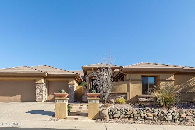 prairie-style home with a garage