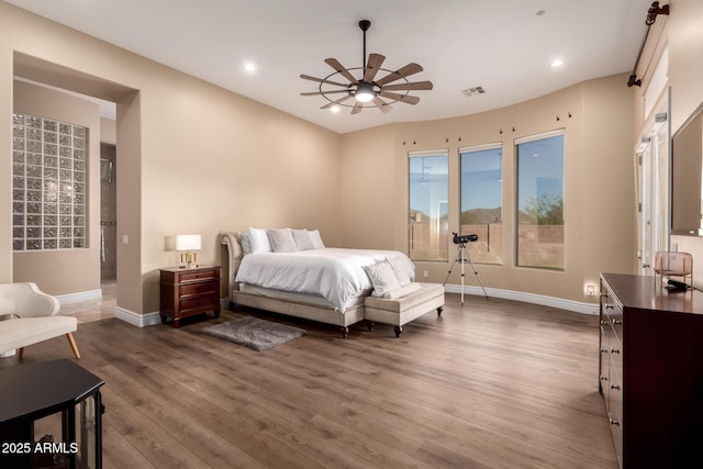 bedroom with hardwood / wood-style flooring