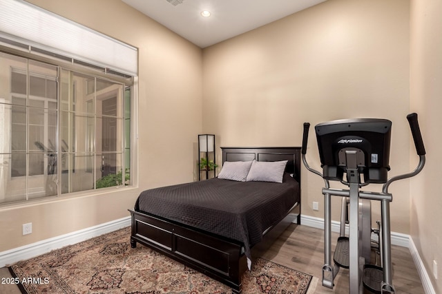 bedroom featuring hardwood / wood-style flooring