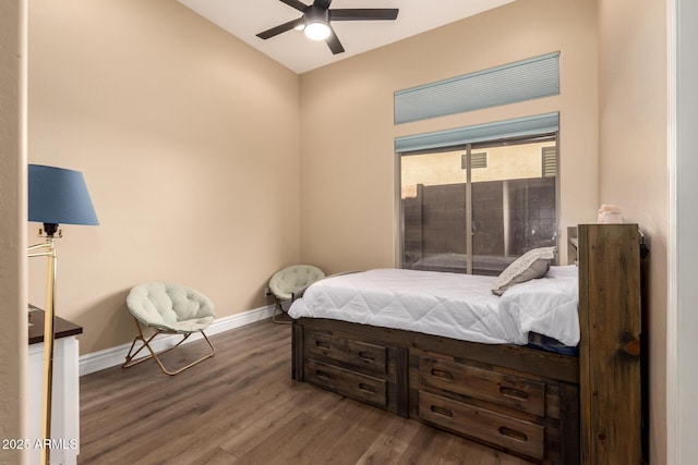 bedroom featuring hardwood / wood-style flooring and ceiling fan