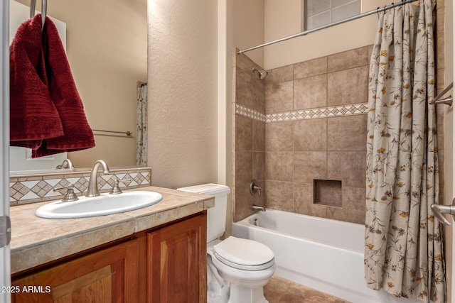 full bathroom featuring vanity, toilet, and shower / bath combo