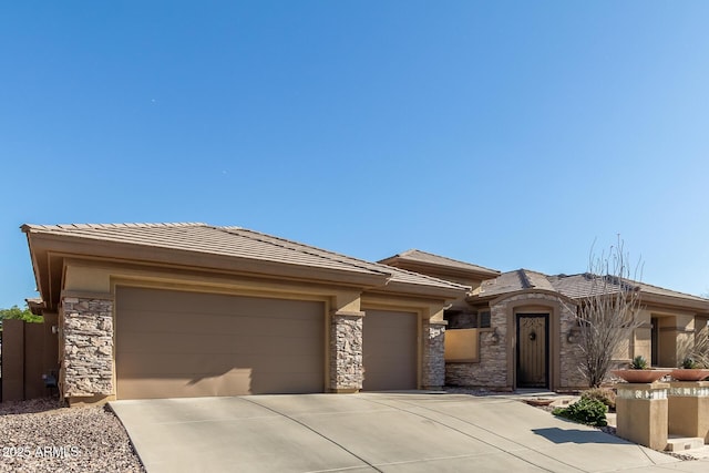 prairie-style home featuring a garage