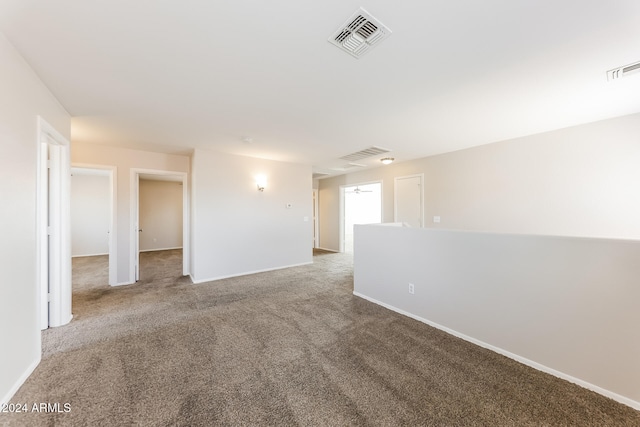 empty room featuring carpet floors