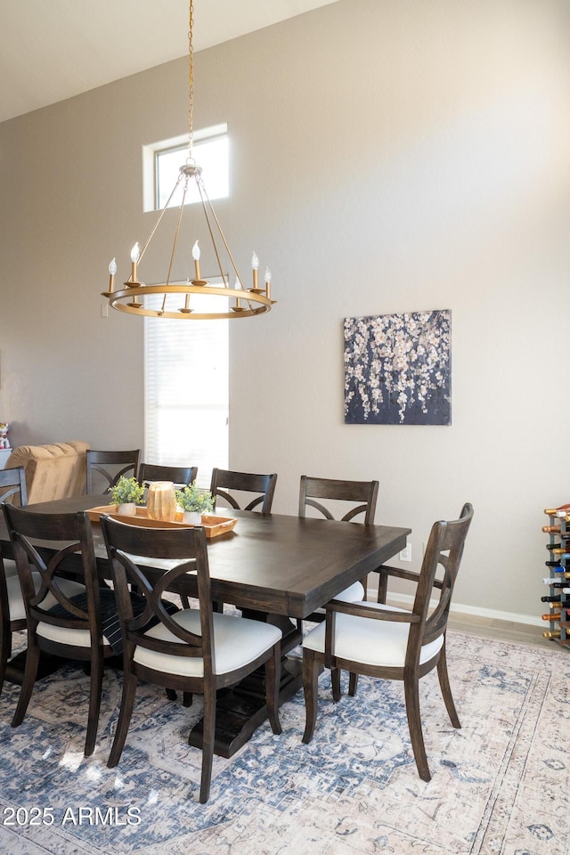 2224 W Olive Way, Chandler, AZ 85248 - dining room with a chandelier and baseboards