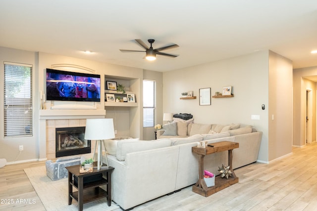 2224 W Olive Way, Chandler, AZ 85248 - living room featuring ceiling fan, light wood-style floors, a fireplace, baseboards, and recessed lighting