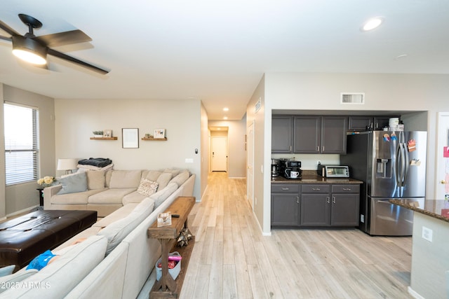 2224 W Olive Way, Chandler, AZ 85248 - living area featuring light wood finished floors, a ceiling fan, recessed lighting, and baseboards