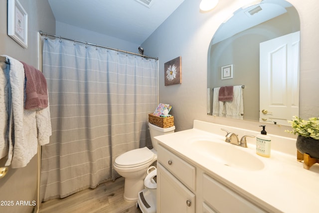 2224 W Olive Way, Chandler, AZ 85248 - bathroom with wood finished floors, vanity, toilet, and a shower with curtain