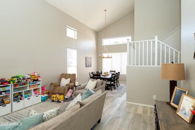 2224 W Olive Way, Chandler, AZ 85248 - game room with wood finished floors, high vaulted ceiling, and baseboards
