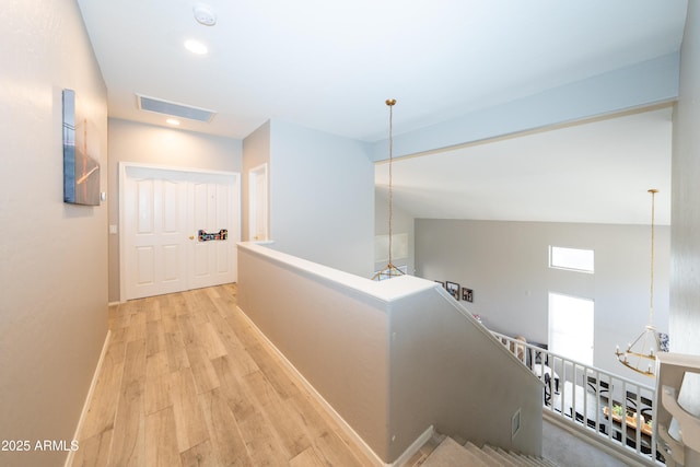 2224 W Olive Way, Chandler, AZ 85248 - hallway featuring an upstairs landing, wood finished floors, recessed lighting, a chandelier, and baseboards