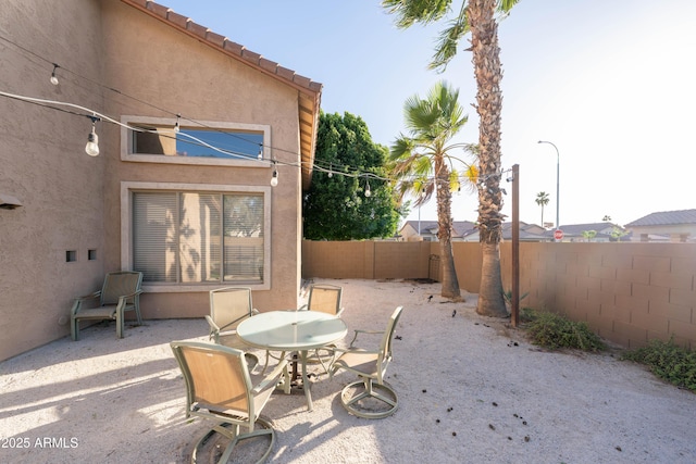 2224 W Olive Way, Chandler, AZ 85248 - view of patio featuring a fenced backyard and outdoor dining area