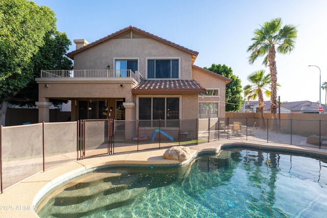 2224 W Olive Way, Chandler, AZ 85248 - back of house with a balcony, stucco siding, a tiled roof, a patio area, and fence