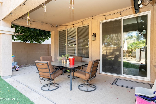 2224 W Olive Way, Chandler, AZ 85248 - view of patio / terrace featuring outdoor dining space and fence