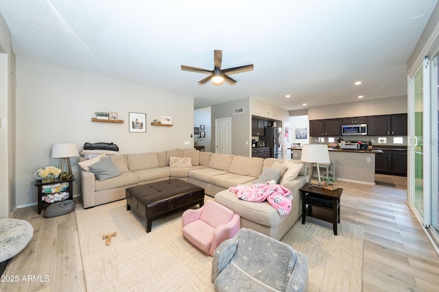 2224 W Olive Way, Chandler, AZ 85248 - living room featuring light wood-type flooring, ceiling fan, and recessed lighting