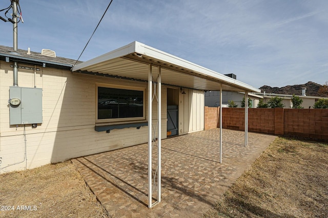 rear view of house featuring a patio area