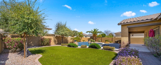 view of yard featuring a patio area and a fenced backyard