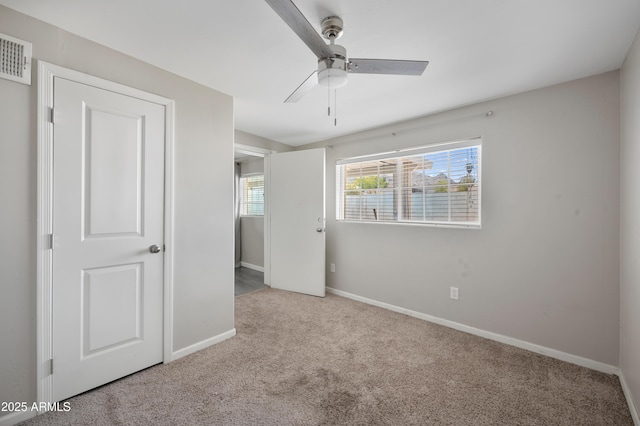 405 W Monte Way, Phoenix, AZ 85041 - unfurnished bedroom featuring carpet, baseboards, and ceiling fan