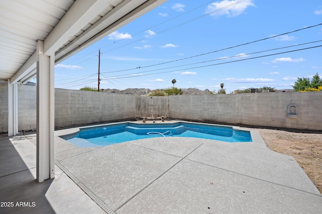 405 W Monte Way, Phoenix, AZ 85041 - view of swimming pool with a patio and a fenced backyard