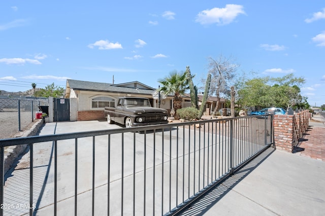 405 W Monte Way, Phoenix, AZ 85041 - view of front of home with a gate and brick siding