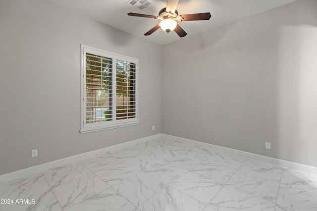 unfurnished room featuring ceiling fan