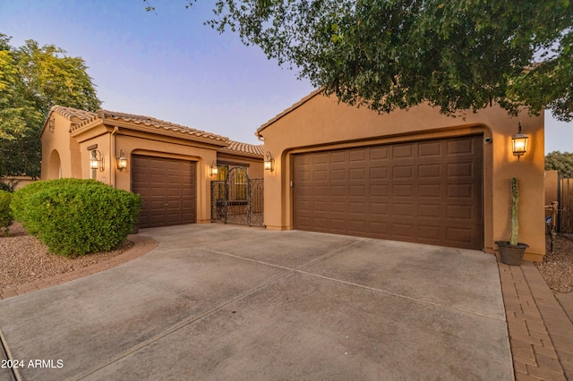 view of front of property with a garage