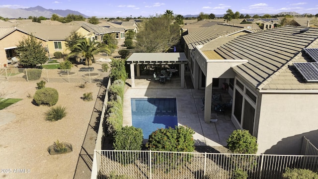 birds eye view of property with a residential view