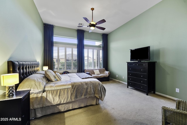 bedroom with baseboards, vaulted ceiling, carpet flooring, a ceiling fan, and visible vents