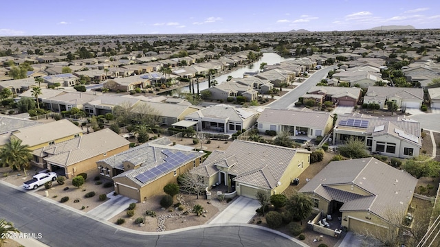 birds eye view of property with a residential view
