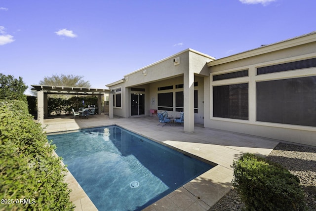 view of pool featuring a pergola and a patio area
