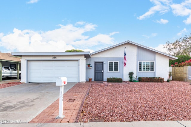 single story home with a garage