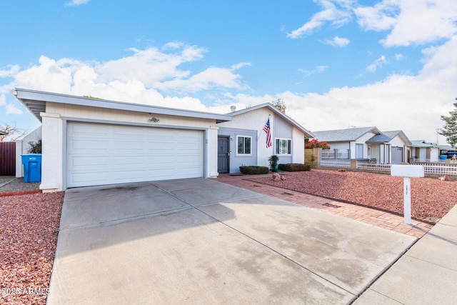 ranch-style home with a garage