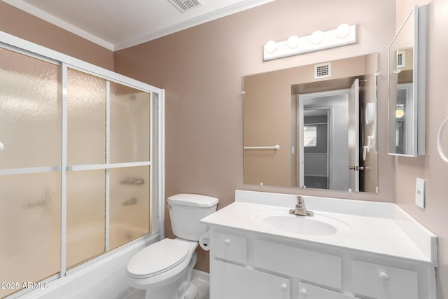 full bathroom with bath / shower combo with glass door, ornamental molding, vanity, and toilet