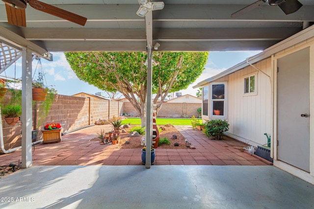 view of patio / terrace featuring ceiling fan