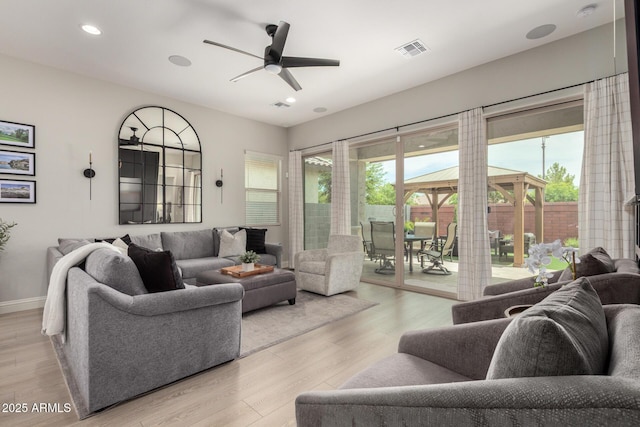 2605 S Quaintance St, Gilbert, AZ 85295 - living area featuring plenty of natural light, a ceiling fan, light wood-style flooring, baseboards, and recessed lighting