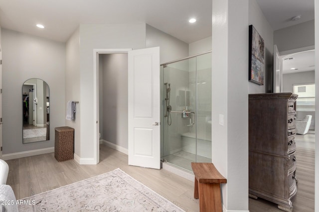 2605 S Quaintance St, Gilbert, AZ 85295 - full bath featuring wood finished floors, a stall shower, baseboards, and recessed lighting