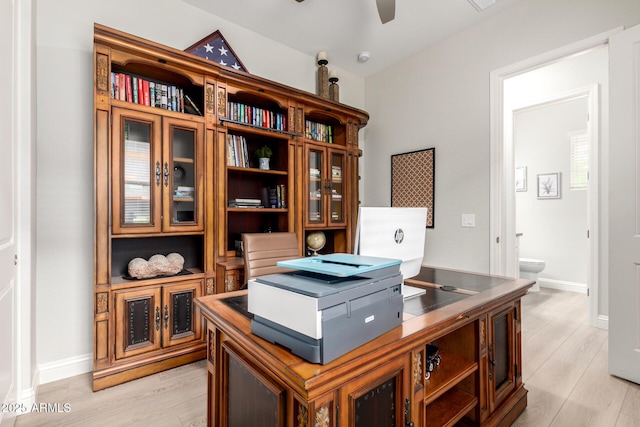 2605 S Quaintance St, Gilbert, AZ 85295 - home office with light wood-style flooring, ceiling fan, and baseboards